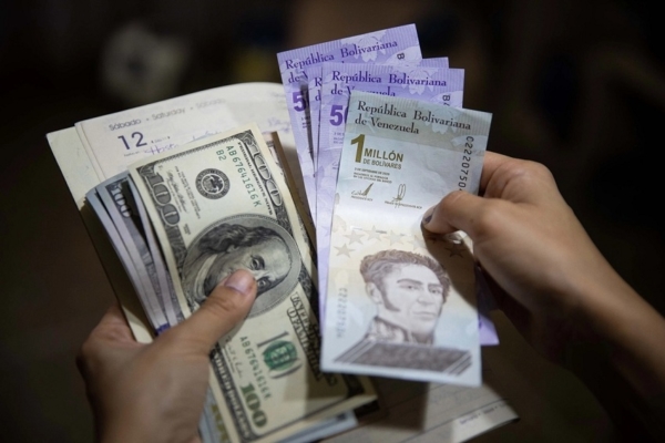 Posible ajuste cambiario podría llevar al dólar oficial a Bs. 40