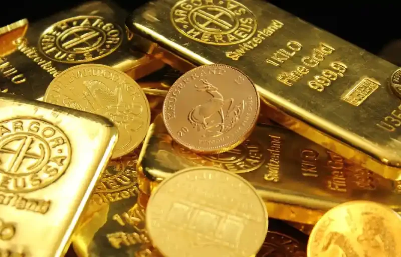 El oro repunta más de 1% por aversión al riesgo y retroceso del dólar